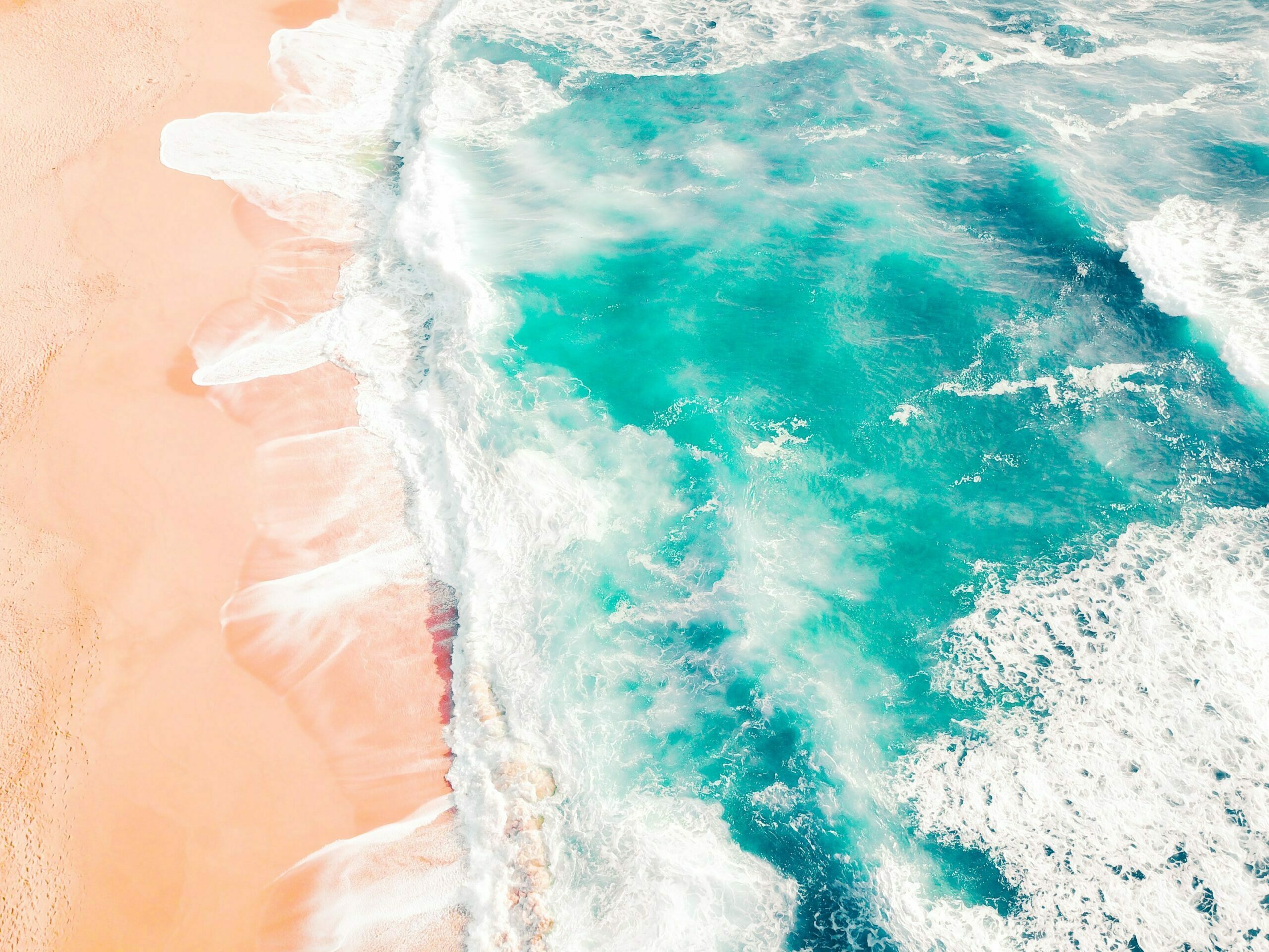 Wavy Sea Side with Pink Sand